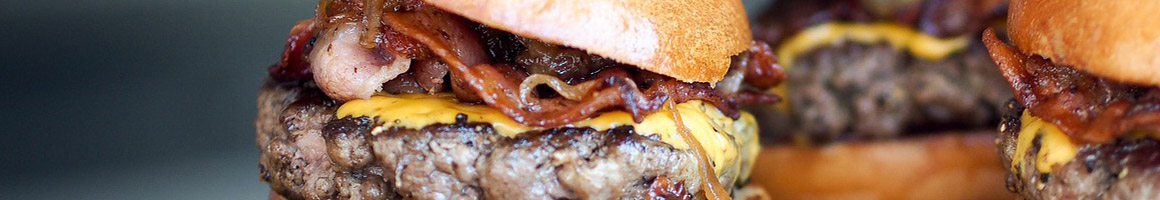 Eating Burger Hot Dog at Melvin's Hamburgers & Hot Dogs restaurant in Elizabethtown, NC.
